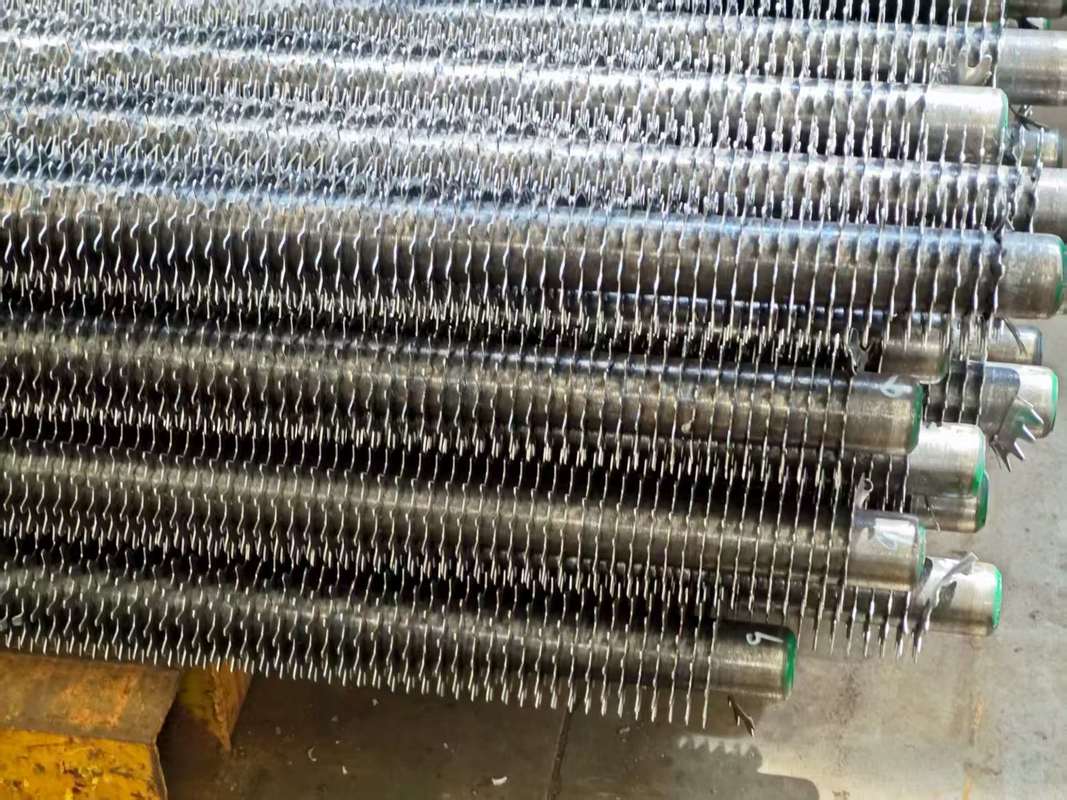 Scambiatore di calore ad alta efficienza con alette per caldaie e anti-incrostazione